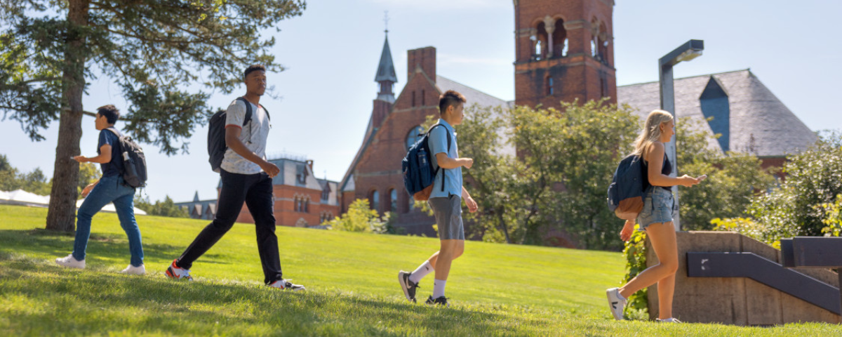 Students pass by Barnes Hall between classes.