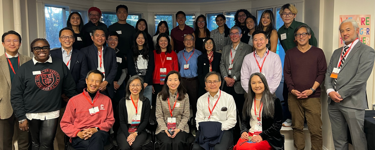 A large group of people pose at Cornell's A3C.