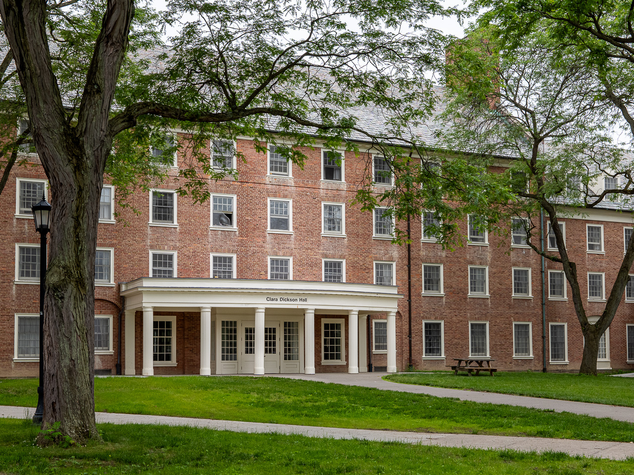 Clara Dickson Hall entrance with an overhand and white pillars