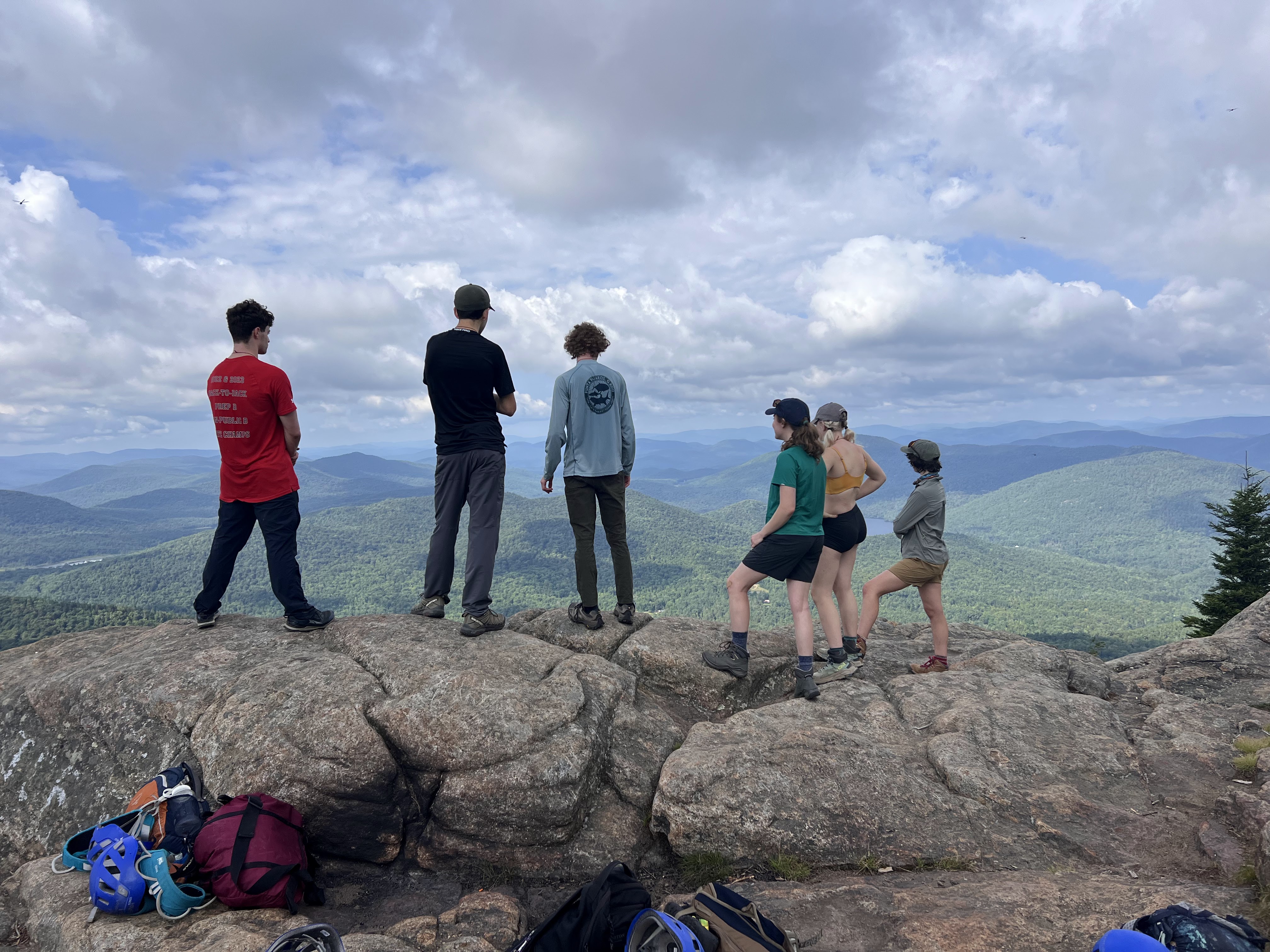 six people on a mountaintop