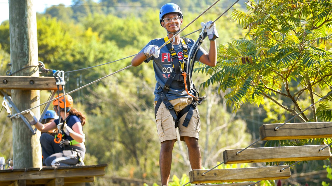 Durjoy Bhadra ’29, on the ropes course at Greek Peak Mountain Resort in Cortland, New York. 
