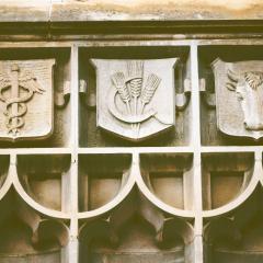 Stone shields above front entrance of WSH