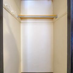 A photo of the inside of a closet.