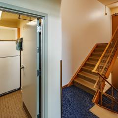 A kitchen and stairwell in JAM.