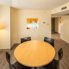 Dining area with a circle table and four chairs