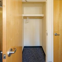 Example of a closet in a single or a double room in Loving House.