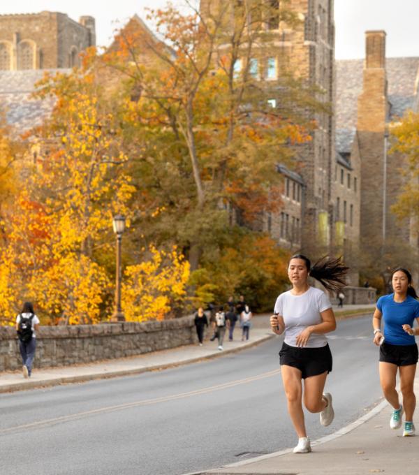 Two students jogging near collegetown.