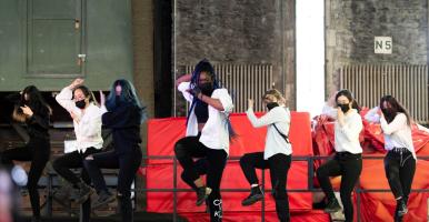 Cornell E.Motion performs a dance.