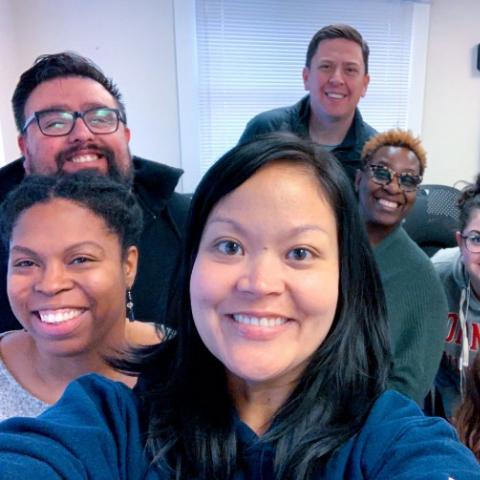 Shakima, Christopher, Nancy, VP Lombardi, Marla, Crissi, and Greta pose inside of 626 Thurston