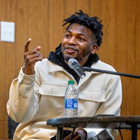 Dante Stewart speaks with students at Calvary Baptist Church