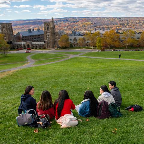 Students sitting on Libe Slope