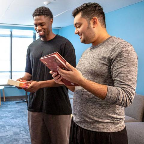 Students reading in Language House Library