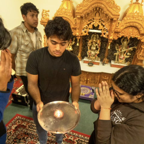 students during a Hindu student council meeting and ceremony